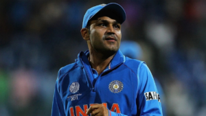 Virender Sehwag in a blue shirt